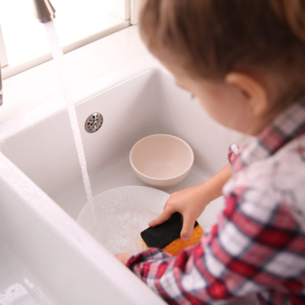 Independence for Children - Child Doing Dishes