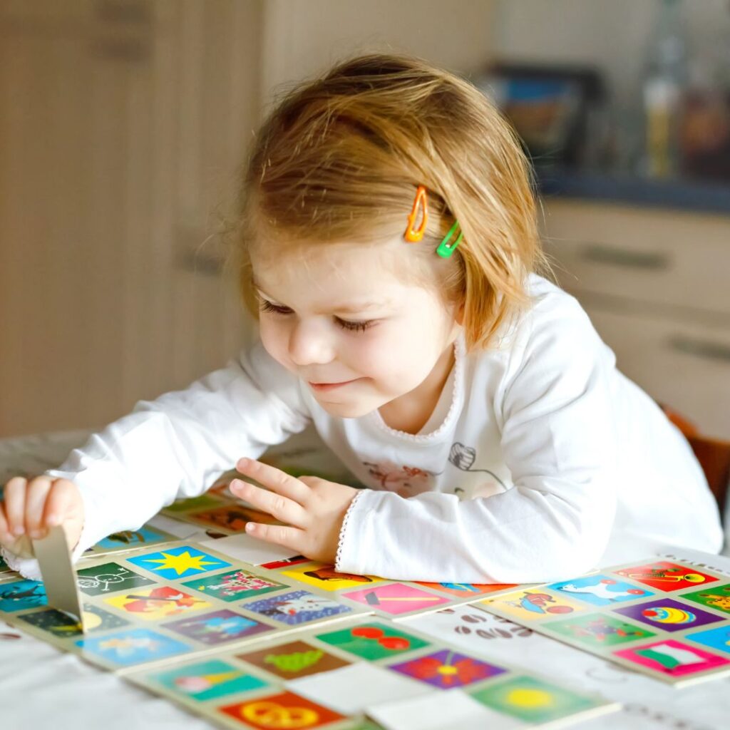 Child Playing Matching Game